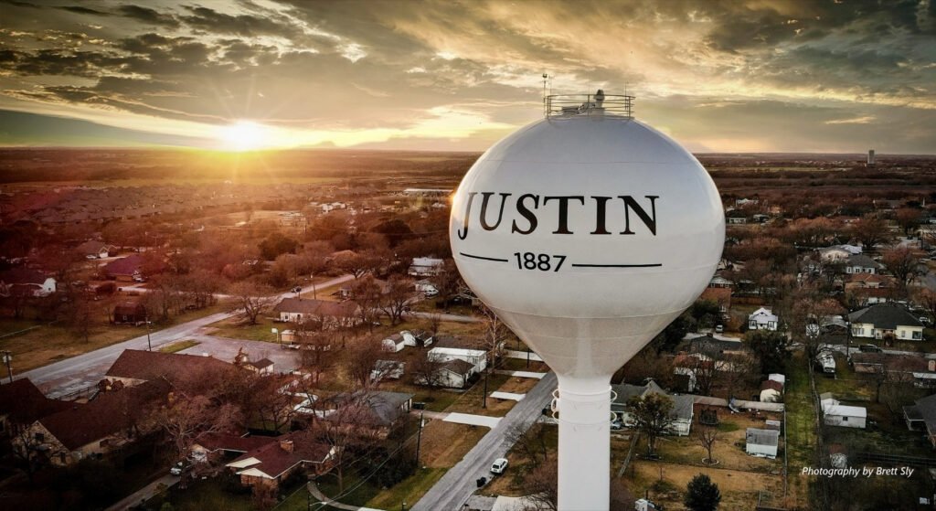Justin, Texas water tower at sunset